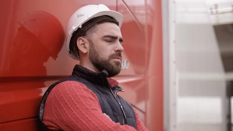 Trailer driver with hard hat and safety vest. Close up portrait of worker Stock Footage 111485452