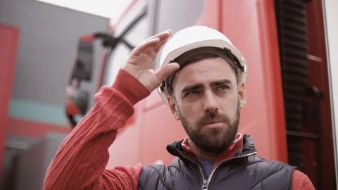 Trailer driver with hard hat and safety vest. Close up portrait of worker Stock Footage 111485996