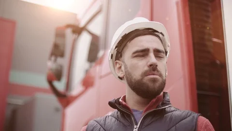 Trailer driver with hard hat and safety vest. Close up portrait of worker Stock Footage 111486201