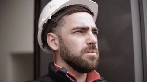 Trailer driver with hard hat and safety vest. Close up portrait of worker Stock Footage 111487562