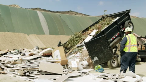 Trailer Dumping Trash In Landfill 4K 48FPS SLO-MO Stock Footage 201899491