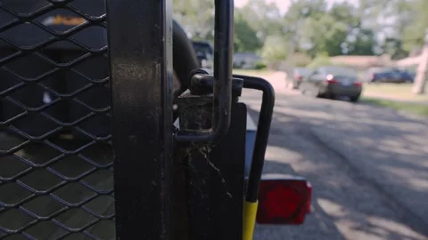 A trailer lock in the unlocked position from behind. Video stock 277628413