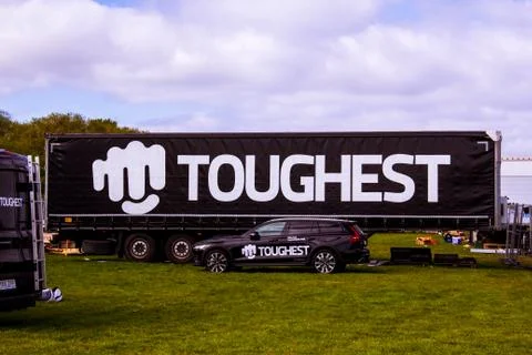 Trailer with the logo of a race called Toughest Stock Photos