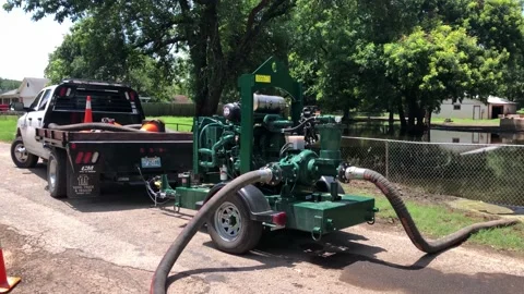 Trailer-mounted pump helps with flooding  Stock Footage 131889328