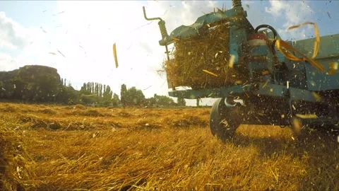 Trailer Of Tractor Making Bales Of Hay Stock-Footage 140281265