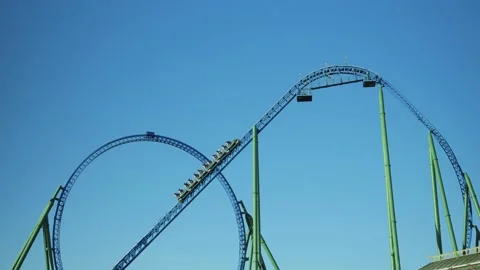 The trailers climb to the highest point of the roller coaster Stock Footage 229614349
