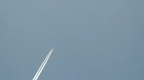 Trails made by airplane Stock Footage 116557