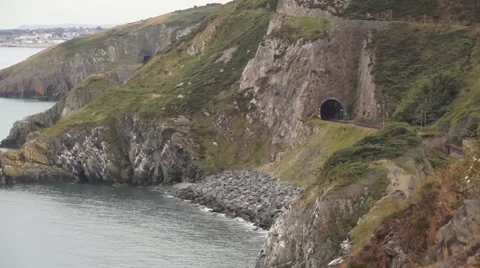 Train along cliffside in Ireland Stock-Footage 53172068
