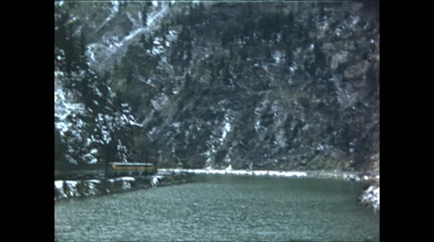 Train Along Mountain River Stock Footage 47663525