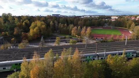 Train from Alppipuisto toward central park, Helsinki Stock Footage 253547572