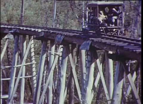 TRAIN AND EARTHMOVING, THE BAW BAWS, AUSTRALIA (1952) Stock Footage 257163639