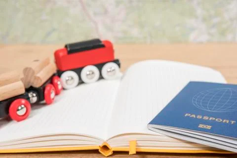 Train and passport on notepad Stock Photos