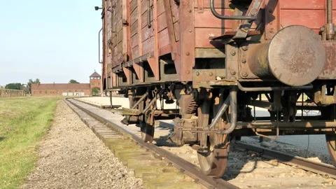 Train and train tracks in Auschwitz Birkenau concentration camp, Poland 스톡 동영상 309911322