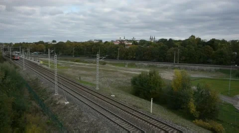 Train approaching city skyline trees Stock Footage 48473819
