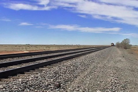 Train approaching in desert Stock Footage 68849
