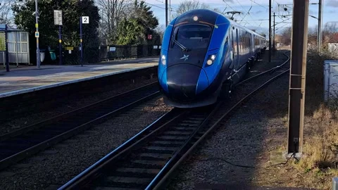 Train approaching the platform Stock Footage 233826654