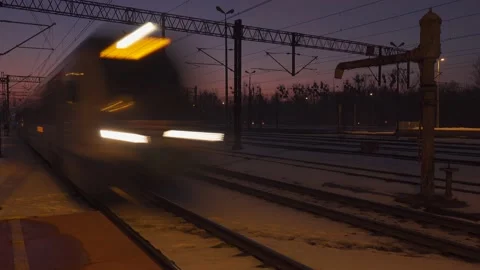 Train approaching on a snowy night Video stock 149218385