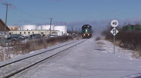 Train approaching in the winter time. Stock-Footage 34273440