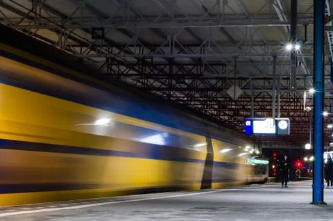 Train ariving at the station Stock Photos