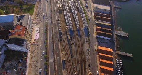 Train arrival at cais do sodre in Lisbon against sun Stock Footage 91221186