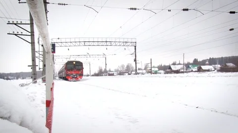 Train arrival at the station in winter. Long-distance trains. Video stock 117843529