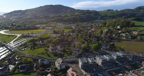 Train arrive in St-Légier station - Aerial 4K Stock Footage 107042753