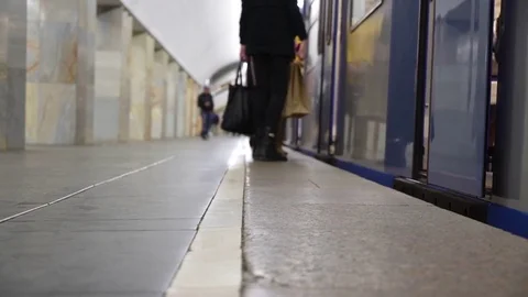 The train arrived on the platform. The doors opened and the passengers got out Stock Footage 76783237
