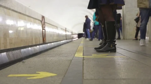 Train arrived on platform. Doors opened and passengers leave and enter car Stock Footage 77411367