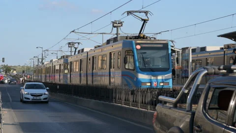 Train arrived to tram stop Kiptas-Venezia in Istanbul, Turkey Stock Footage 321551401