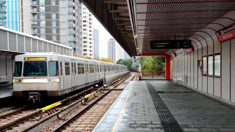 Train arrives at the ground level station in Vienna, Austria. Stock Footage 289562314