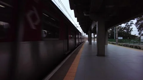 Train arrives  platform of a CEAGESP station on the emerald line 9 of CPTM Video stock 244001983