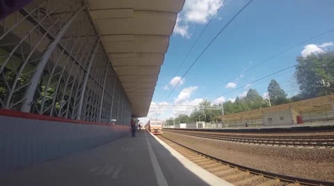 Train arrives at the station Stock Footage 55768029
