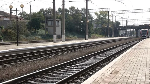 The train arrives at the train station Stock Footage 119106064