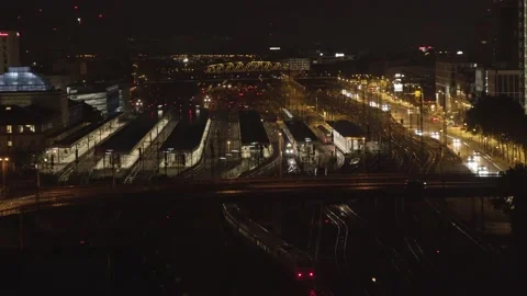 Train arrives at the Train Station in Mannheim City at Night Stock Footage 132725476