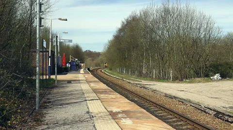 Train arriving at Entwistle request stop railway station Lancashire Stock Footage 62995758