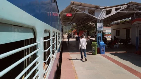 Train arriving at the Rishikesh railway station. Stock Footage 117342274