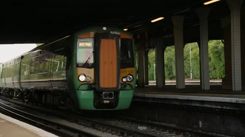 Train arriving at the station, England Stock Footage 45851876