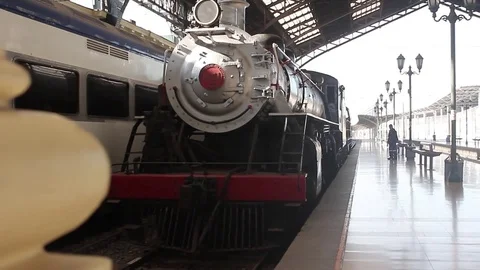 Train arriving at station Stock Footage 77100945