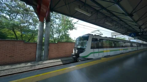 TRAIN ARRIVING AT THE STATION Stock Footage 234469437