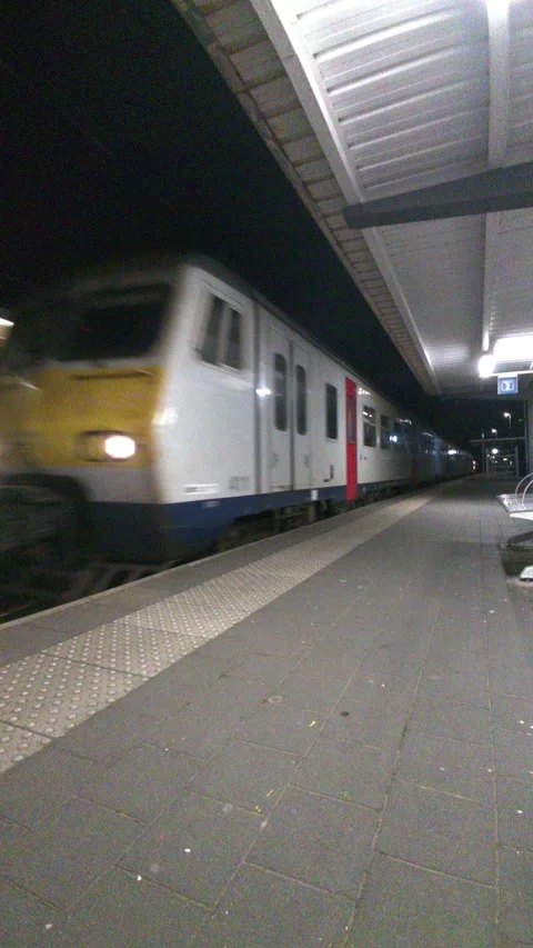 Train arriving at station Stock Footage 331568427