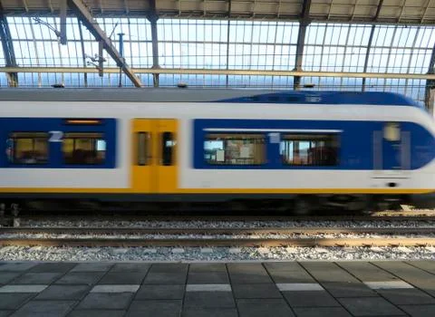 Train arriving at station Stock Photos