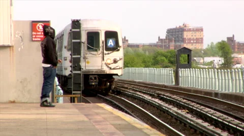 A Train arriving to Station Platform Brooklyn New York Coney Island Stock Footage 49223232