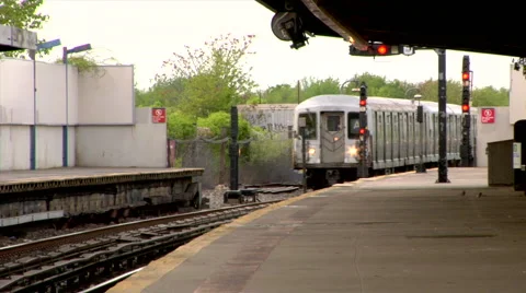 A Train arriving to Station Platform Brooklyn New York Coney Island Stock Footage 49223238