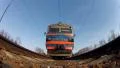 Train is arriving to the station. Under train view HD Footage