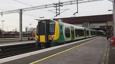 Train arriving at train station Stock Footage 57685953