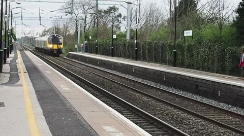 Train arriving at train station Stock Footage 57692446