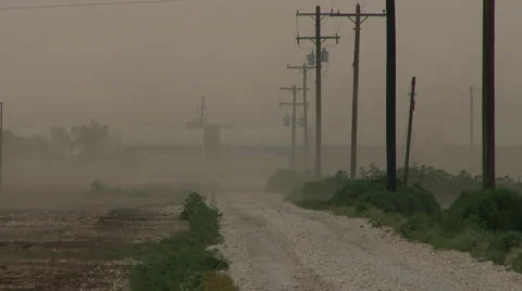 Train in blowing sand at the end of the road Stock Footage 51292072