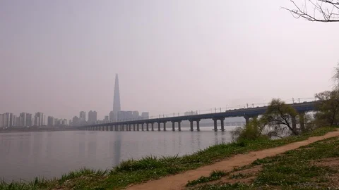 Train on Bridge across Han River, Seoul panorama, South Korea Stock Footage 93320714
