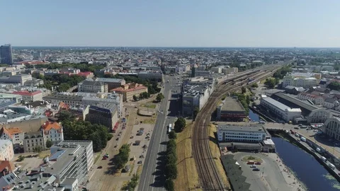 Train bridge and rail roads with train in Riga City Slowmotion drone Flight near Video stock 91278300