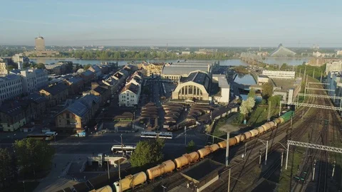 Train bridge and rail roads with train in Riga City Slowmotion drone Flight near 動画素材 91287115